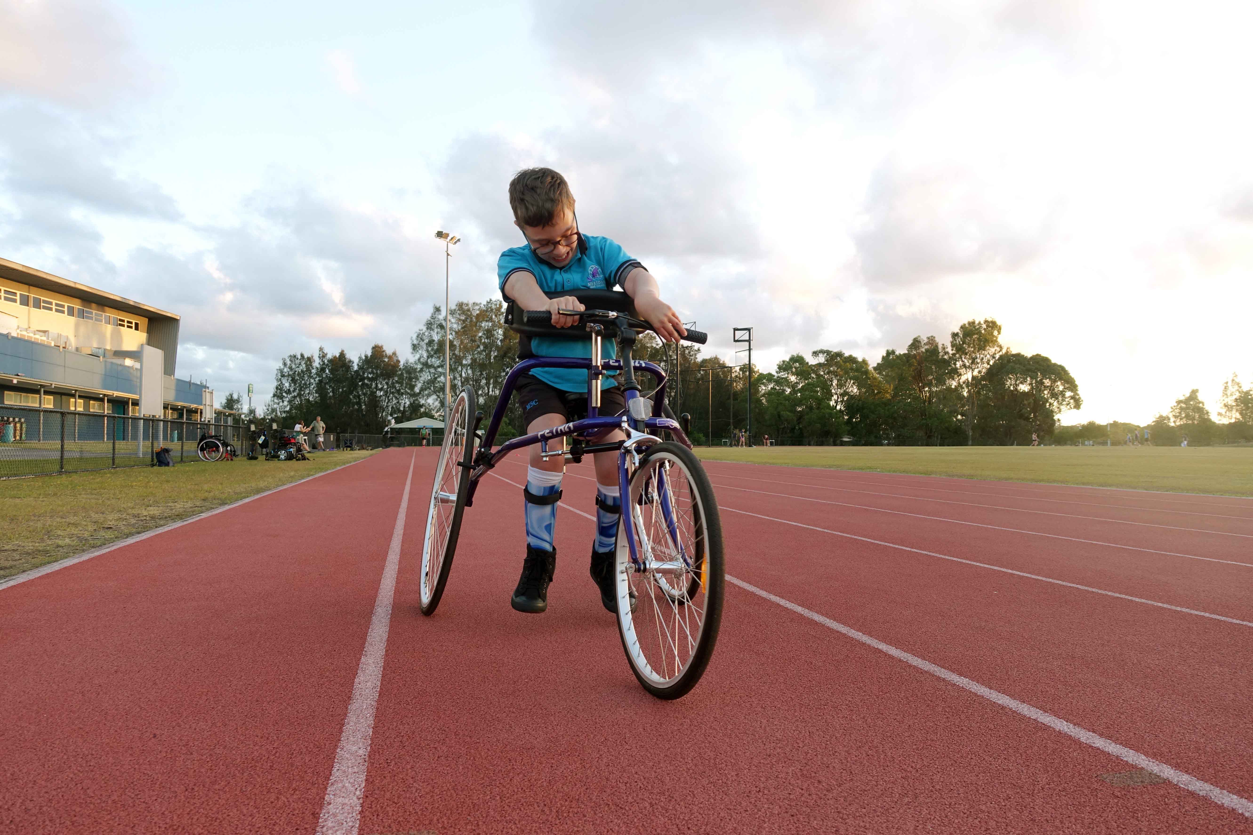 Child with cerebral palsy frame running